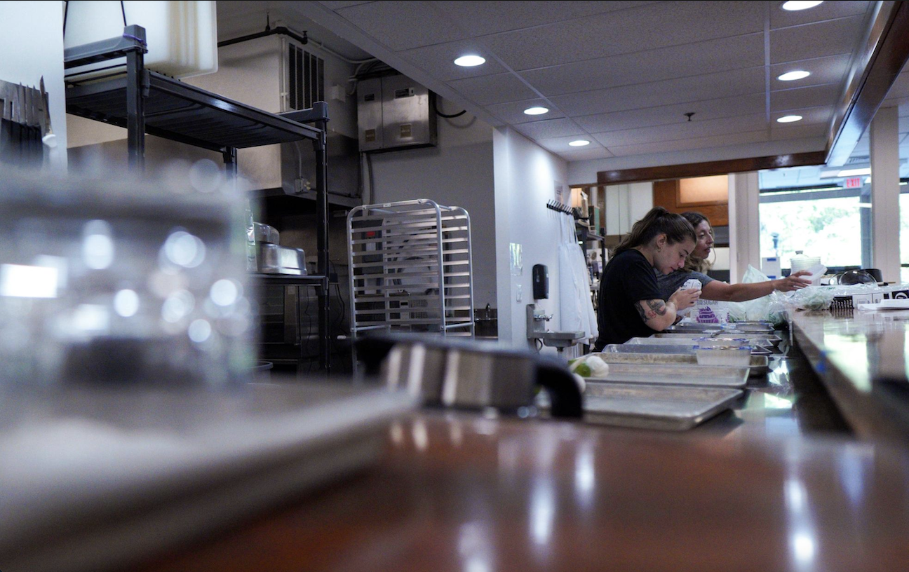 Students prepare meals in the World on a Plate class in September 2023.