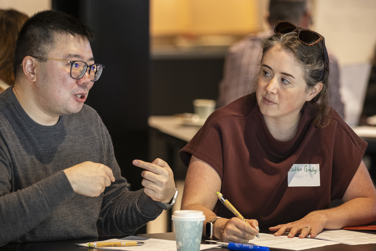 GFI's Caitlin Grady talking to Zhengtian Xu who is an engineering professor at SEAS.