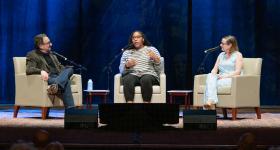 “Science Friday” host Ira Flatow (l), Imani Black and Tara Scully onstage during the recording of 'Science Friday.'