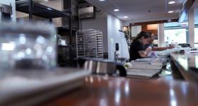 Students prepare meals in the World on a Plate class in September 2023.